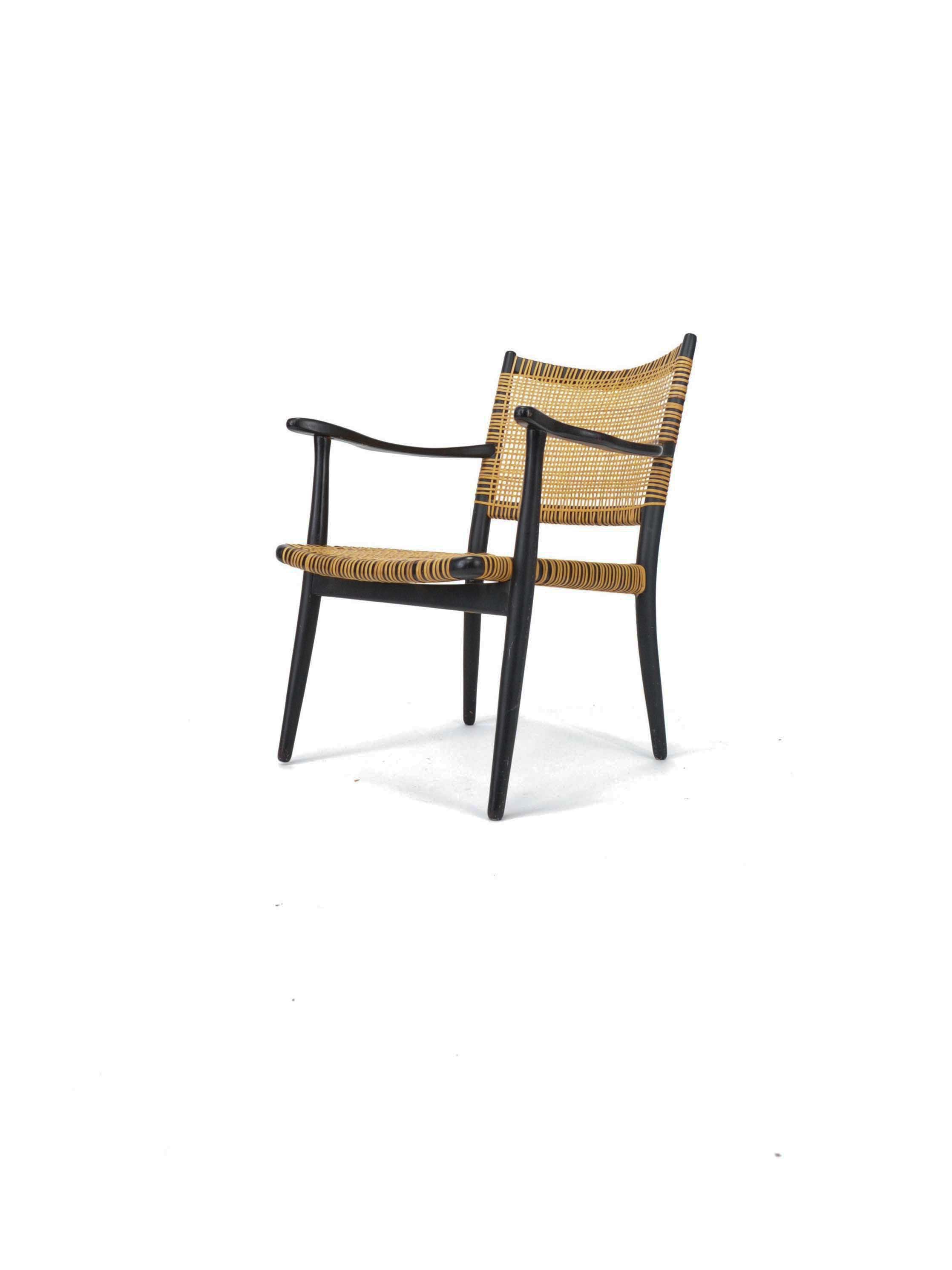 MID CENTURY ARMCHAIR IN RATTAN